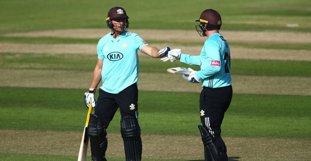 Roy & Evans lead Surrey to top of table