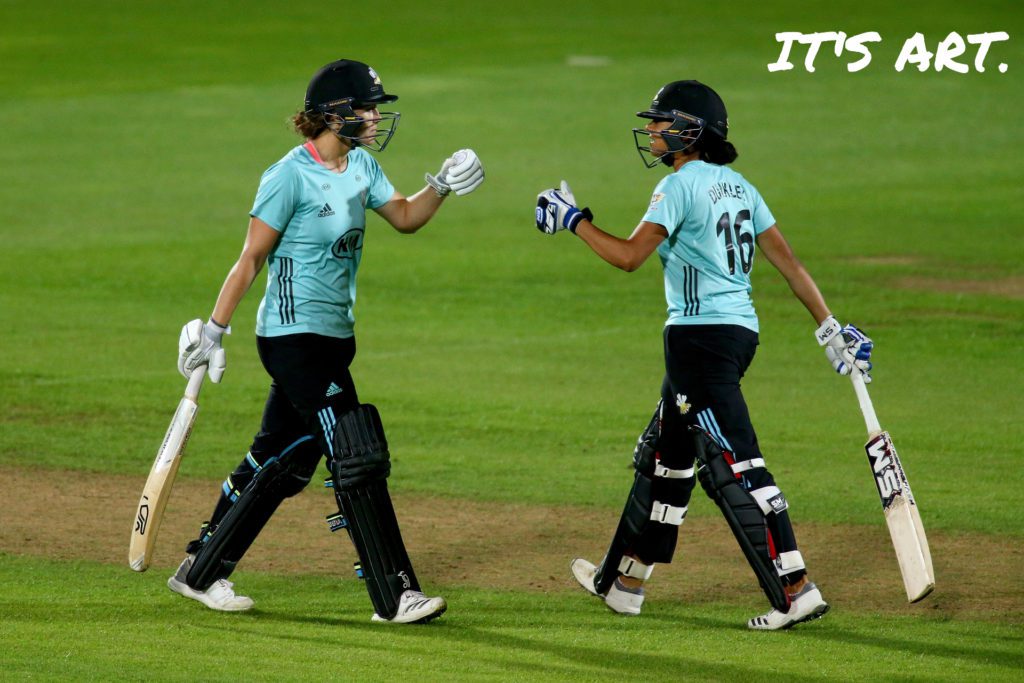 Sophia Dunkley and Nat Sciver bump fists