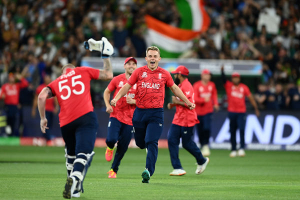 MELBOURNE, AUSTRALIA - NOVEMBER 13: Ben Stokes and Sam Curran of England celebrate winning the ICC Men's T20 World Cup Final match between Pakistan and England at the Melbourne Cricket Ground on November 13, 2022 in Melbourne, Australia. (Photo by Quinn Rooney/Getty Images)