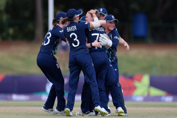 POTCHEFSTROOM, SOUTH AFRICA - JANUARY 27: Alexa Stonehouse of England celebrates with teammates after Maggie Clark of Australia ( not pictured ) is dismissed during the ICC Women's U19 T20 World Cup 2023 Semi Final match between England and Australia  at JB Marks Oval on January 27, 2023 in Potchefstroom, South Africa. (Photo by Nathan Stirk-ICC/ICC via Getty Images)