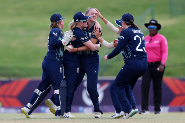 POTCHEFSTROOM, SOUTH AFRICA - JANUARY 27: Alexa Stonehouse of England celebrates with teammates after bowling and catching out Sianna Ginger of Australia ( not pictured ) during the ICC Women's U19 T20 World Cup 2023 Semi Final match between England and Australia  at JB Marks Oval on January 27, 2023 in Potchefstroom, South Africa. (Photo by Matthew Lewis-ICC/ICC via Getty Images)