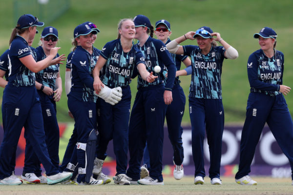 POTCHEFSTROOM, SOUTH AFRICA - JANUARY 27: Alexa Stonehouse of England celebrates with teammates after bowling and catching out Sianna Ginger of Australia ( not pictured ) during the ICC Women's U19 T20 World Cup 2023 Semi Final match between England and Australia  at JB Marks Oval on January 27, 2023 in Potchefstroom, South Africa. (Photo by Matthew Lewis-ICC/ICC via Getty Images)