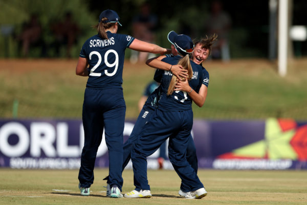 POTCHEFSTROOM, SOUTH AFRICA - JANUARY 27: Hannah Baker of England celebrates with teammate Ryana MacDonald-Gay after Rhys McKenna of Australia ( not pictured ) is dimissed during the ICC Women's U19 T20 World Cup 2023 Semi Final match between England and Australia  at JB Marks Oval on January 27, 2023 in Potchefstroom, South Africa. (Photo by Nathan Stirk-ICC/ICC via Getty Images)