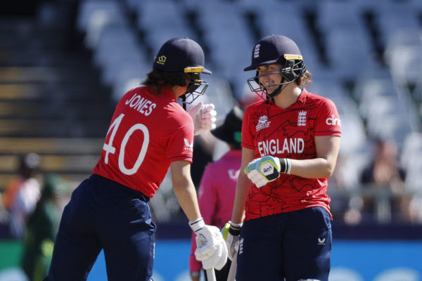 England's Amy Jones (L) and England's Nat Sciver-Brunt (R) react in the pitch during the Group B T20 women's World Cup cricket match between England and Pakistan at Newlands Stadium in Cape Town on February 21, 2023. (Photo by Marco Longari / AFP) (Photo by MARCO LONGARI/AFP via Getty Images)