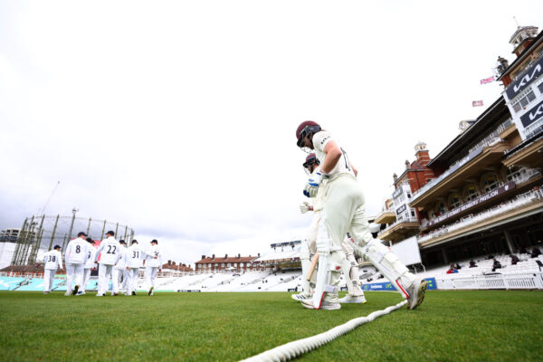 Surrey v Hampshire - LV= Insurance County Championship LONDON, ENGLAND - APRIL 14: Rory Burns and Dominic Sibley of Surrey walk out to bat at the start of the days play during the LV= Insurance County Championship Division 1 match between Surrey and Hampshire at The Kia Oval on April 14, 2023 in London, England. (Photo by Clive Rose/Getty Images)
