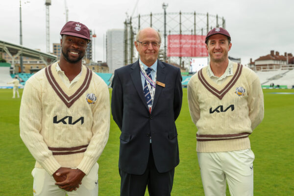 LONDON, ENGLAND - MAY 12: Dan Worrall and Kemar Roach of Surrey receive their Surrey County caps during Day Two of the LV= Insurance County Championship match between Surrey and Middlesex at The Kia Oval on May 12, 2023 in London, England. (Photo by Luke Walker/Getty Images for Surrey CCC)
