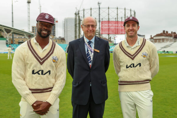 LONDON, ENGLAND - MAY 12: Dan Worrall and Kemar Roach of Surrey receive their Surrey County caps during Day Two of the LV= Insurance County Championship match between Surrey and Middlesex at The Kia Oval on May 12, 2023 in London, England. (Photo by Luke Walker/Getty Images for Surrey CCC)