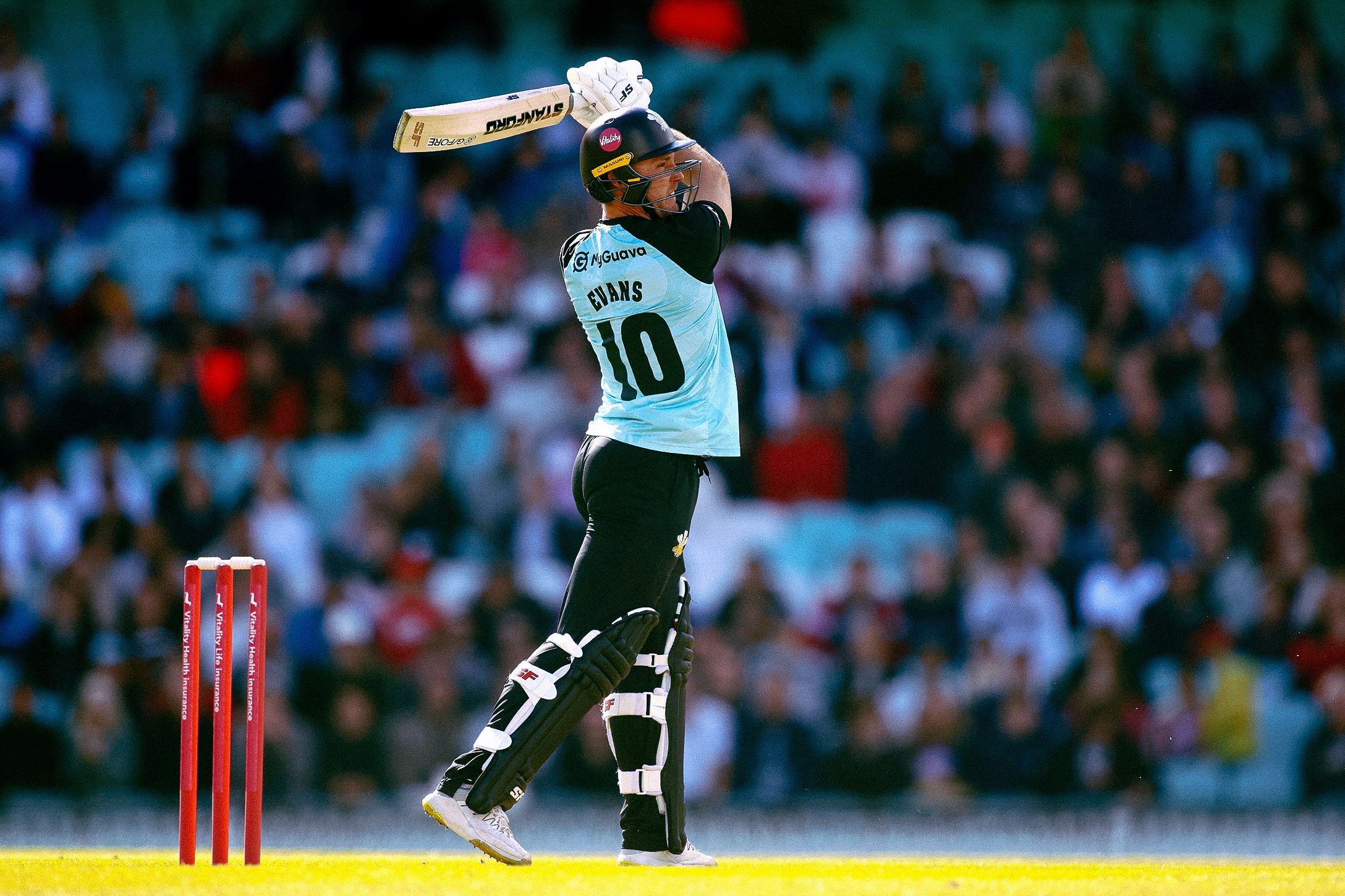 Surrey hold their nerve to see off Spitfires