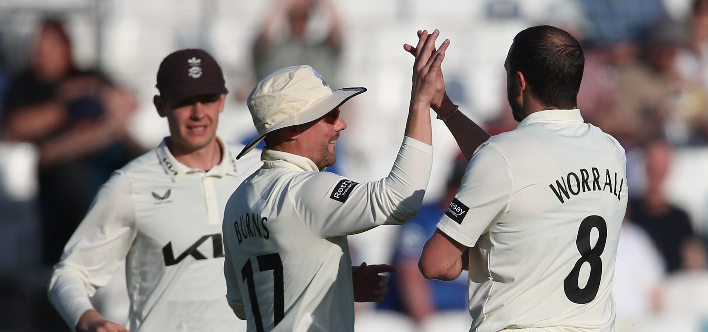 Surrey dominate day two with bat and ball