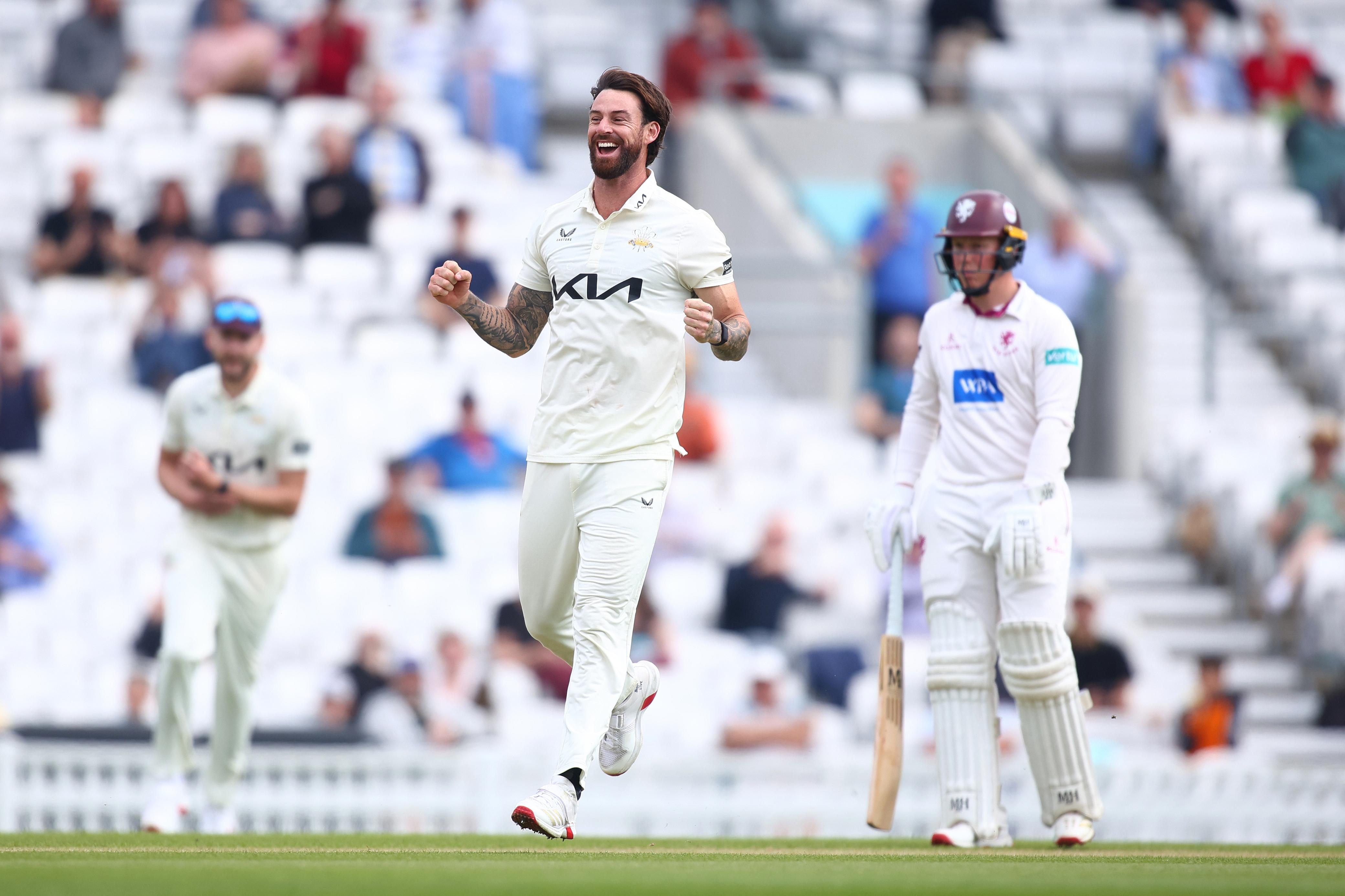 Surrey seamers stir storm to secure first win of season