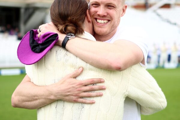 Surrey v Middlesex - LV= Insurance County Championship LONDON, ENGLAND - MAY 11: Matt Dunn of Surrey receives caps after running from Lords to The Kia Oval in memory of his daughter Florence during the LV= Insurance County Championship Division 1 match between Surrey and Middlesex at The Kia Oval on May 11, 2023 in London, England. (Photo by Ben Hoskins/Getty Images for Surrey CCC)