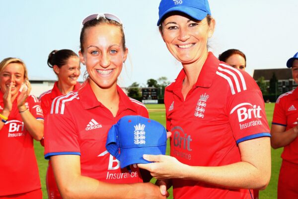 England Women v Pakistan Women: 1st & 2nd NatWest Women's International T20 LOUGHBOROUGH, ENGLAND - JULY 05: Charlotte Edwards, Captain of England presents Natasha Farrant with her cap ahead of the 1st NatWest Women's International T20 match between England Women and Pakistan Women on July 5, 2013 in Loughborough, England. (Photo by Matthew Lewis/Getty Images)